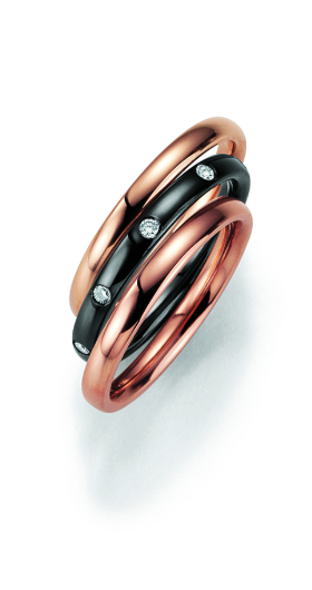 Mehrreihiger Ring in Roségold und Schwarz mit weißen Zirkonia-Steinen
