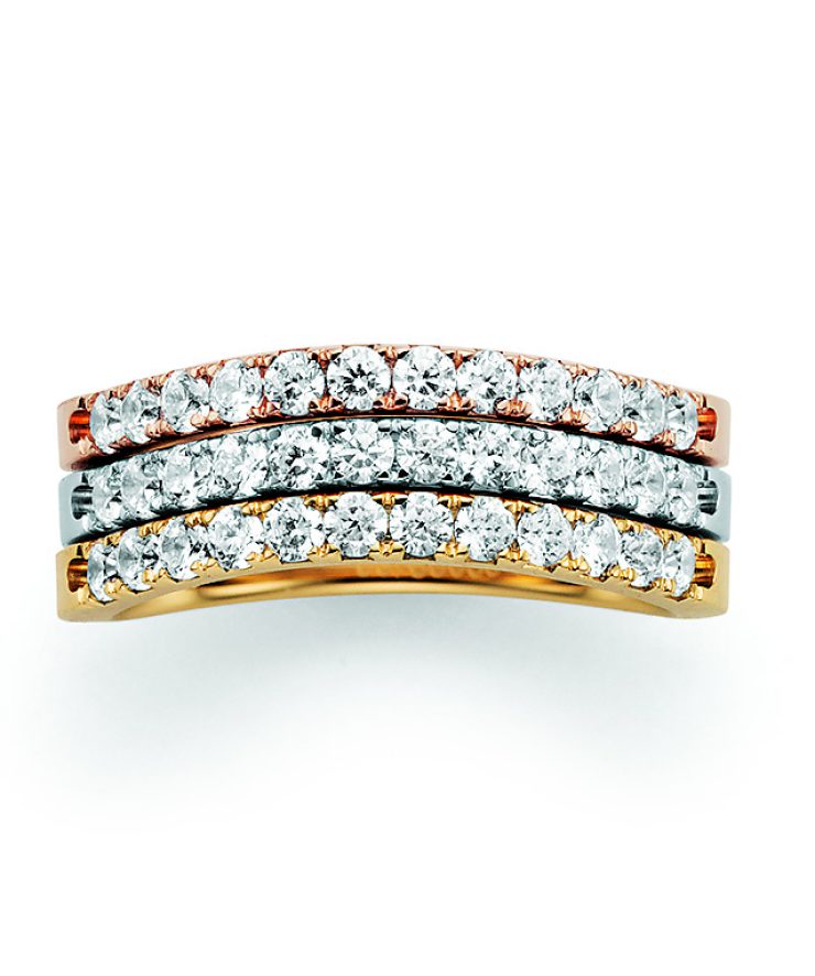 Exklusiver Ring in Gelb-, Weiß- und Roségold mit drei parallel verlaufenden Reihen funkelnder Brillanten in elegant geschwungener Form